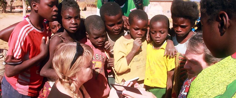 Kids looking at smartphones
