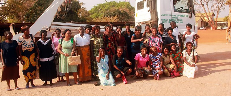 The Chinsali Waste Management Enterprise in front of the dumper truck