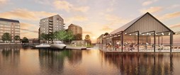 Vattennära bostäder och parkområde.