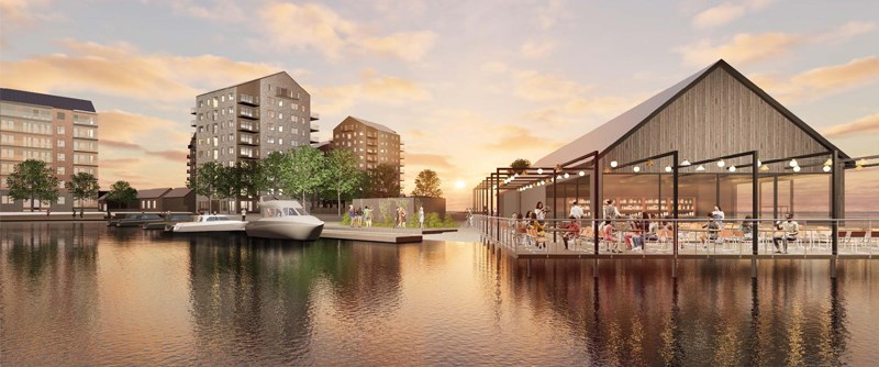 Vattennära bostäder och parkområde.